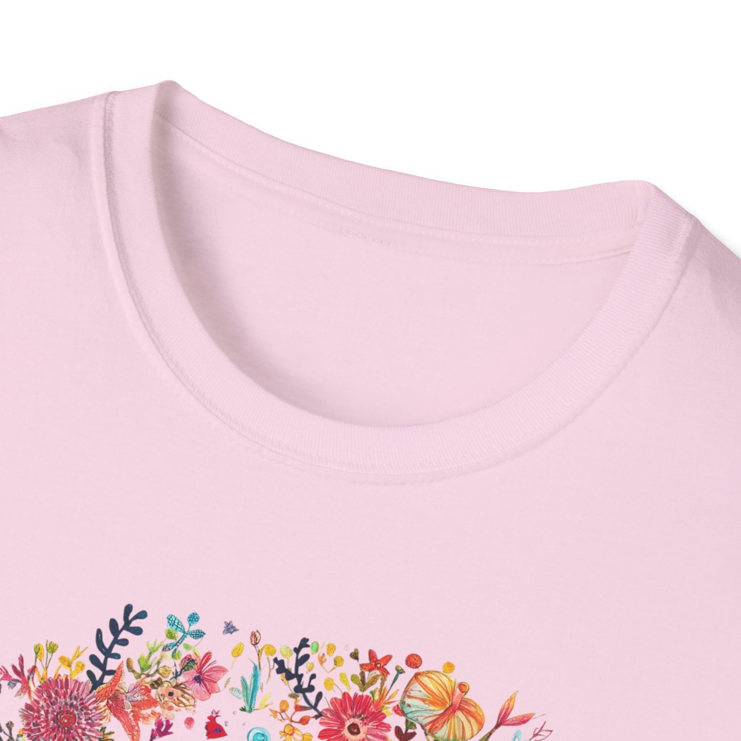 Aquarius floral t-shirt featuring vibrant floral designs on a soft pink fabric