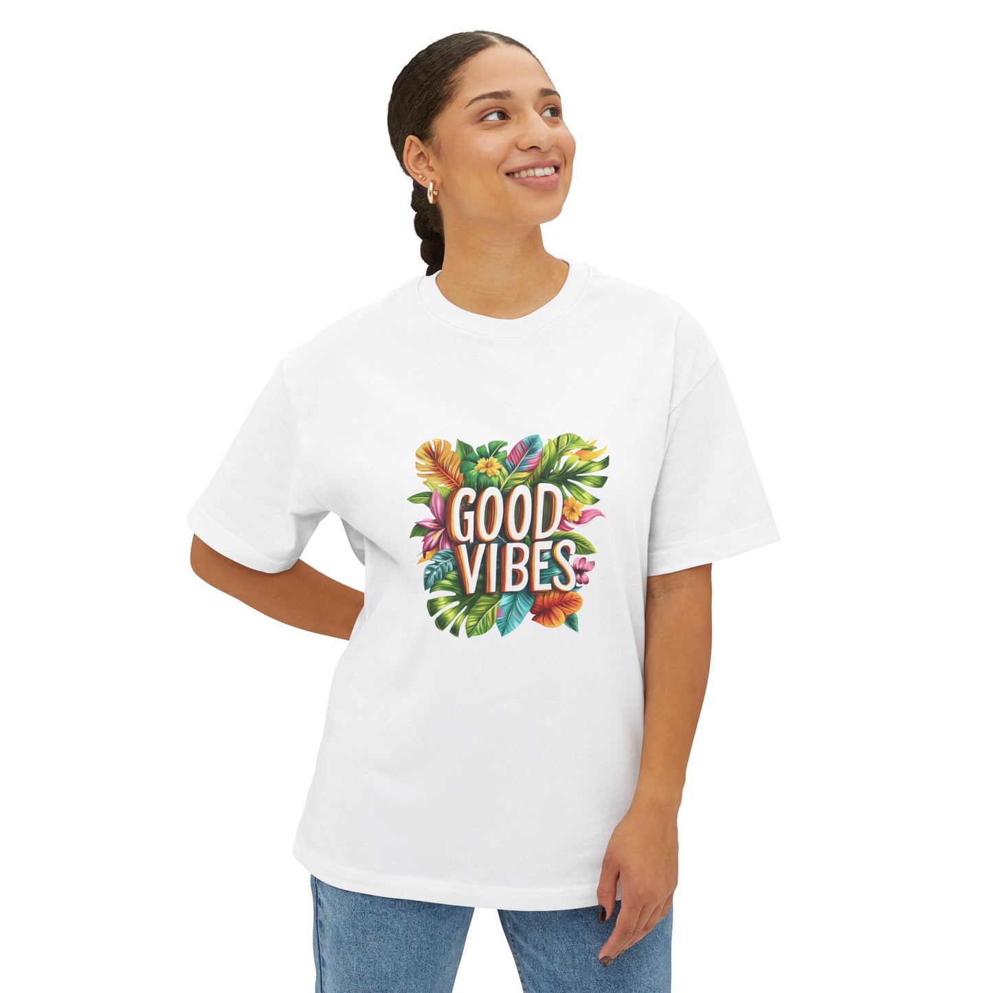 Model wearing a white good vibes oversized t shirt with a colorful floral design
