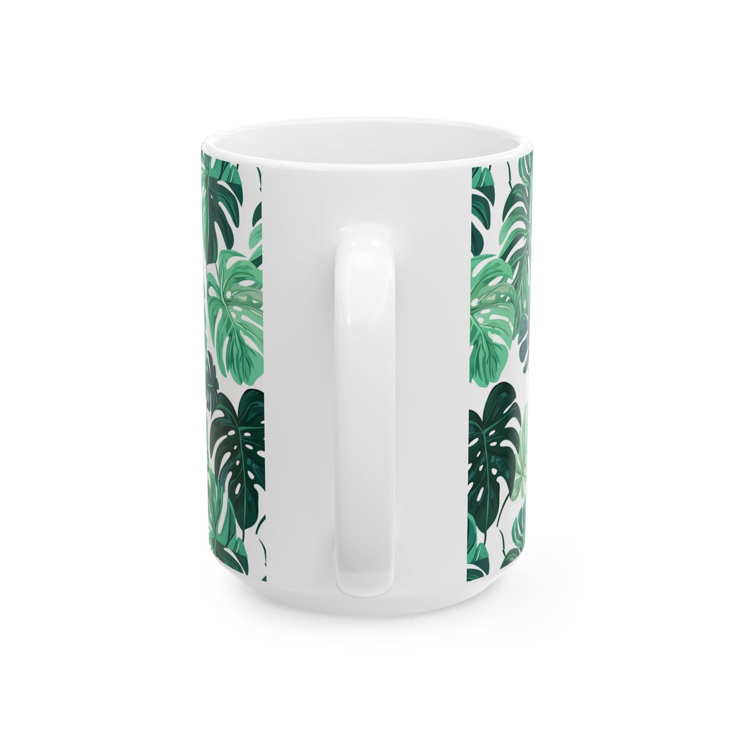 Printify white ceramic monstera leaf coffee mug with wraparound green leaf pattern and center handle view