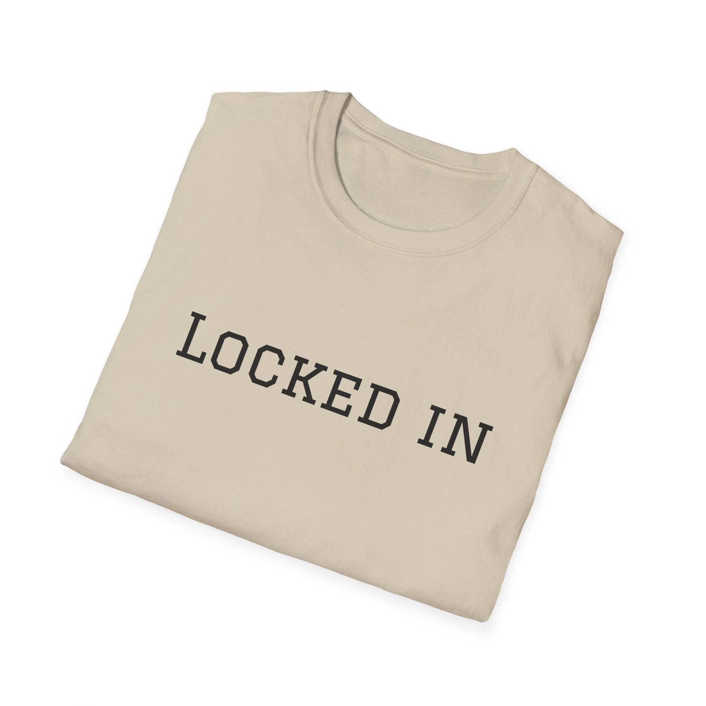 Beige folded crewneck Printify t shirt with black LOCKED IN varsity lettering locked in t shirt motivational