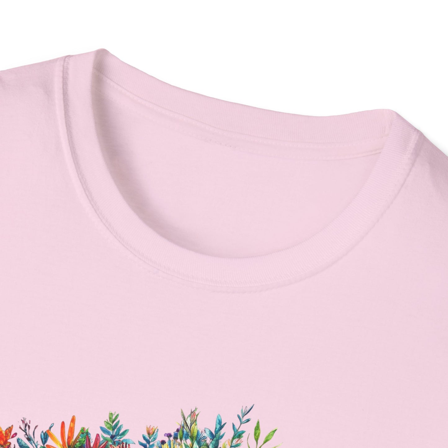 Light pink skoolie bus t-shirt featuring a colorful floral design on the front