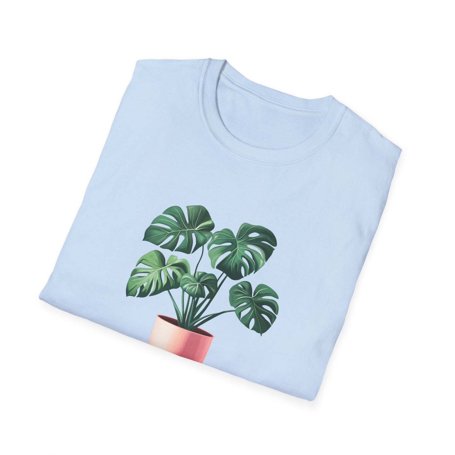 Light blue monstera deliciosa t-shirt featuring a vibrant plant graphic on the front