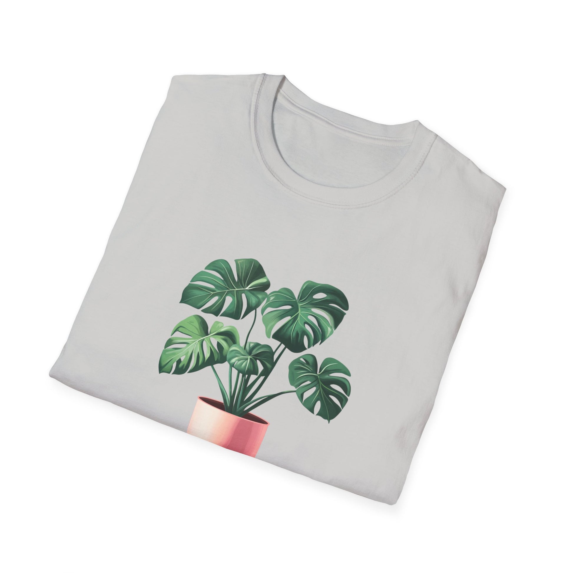 Monstera deliciosa t-shirt featuring vibrant plant graphics on a light gray background