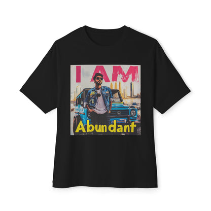 Black abundant vibe oversized tee featuring graphic design with the text I AM Abundant