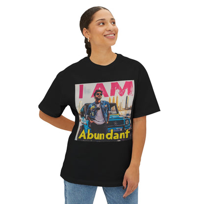 Model wearing a black abundant vibe oversized tee featuring colorful graphic design and relaxed fit