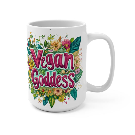 White ceramic vegan goddess mug with colorful floral design and bold pink lettering for coffee tea