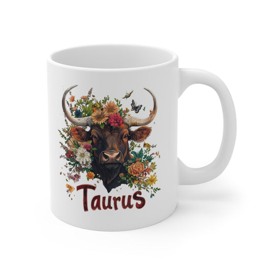 Floral Taurus coffee cup featuring a bull design surrounded by vibrant flowers and the Taurus text
