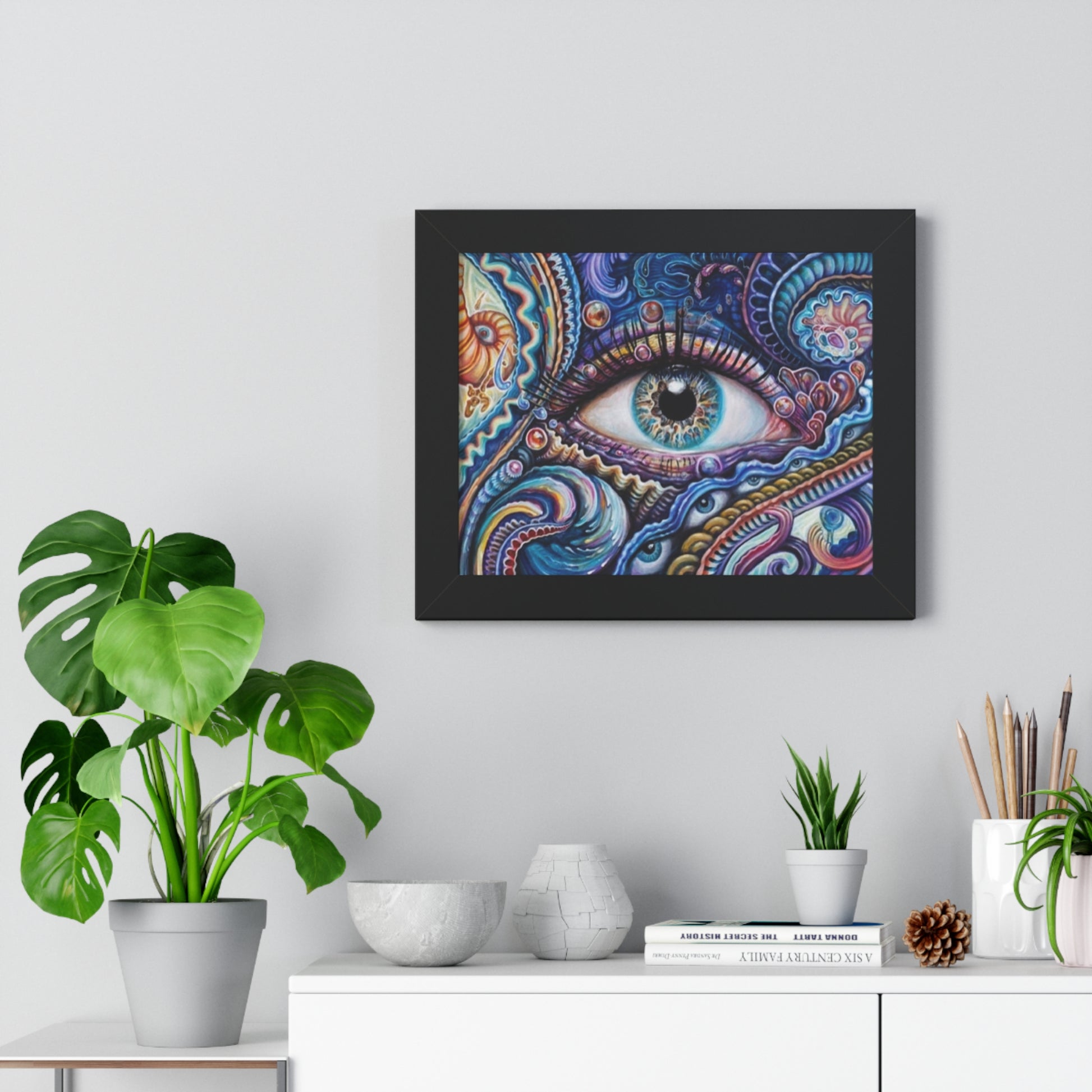 Vibrant horizontal eye art poster framed in black, featuring intricate patterns and colors