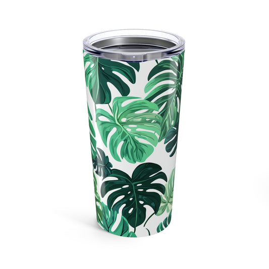 Stylish plant lover travel tumbler featuring lush green monstera leaves for eco-friendly hydration