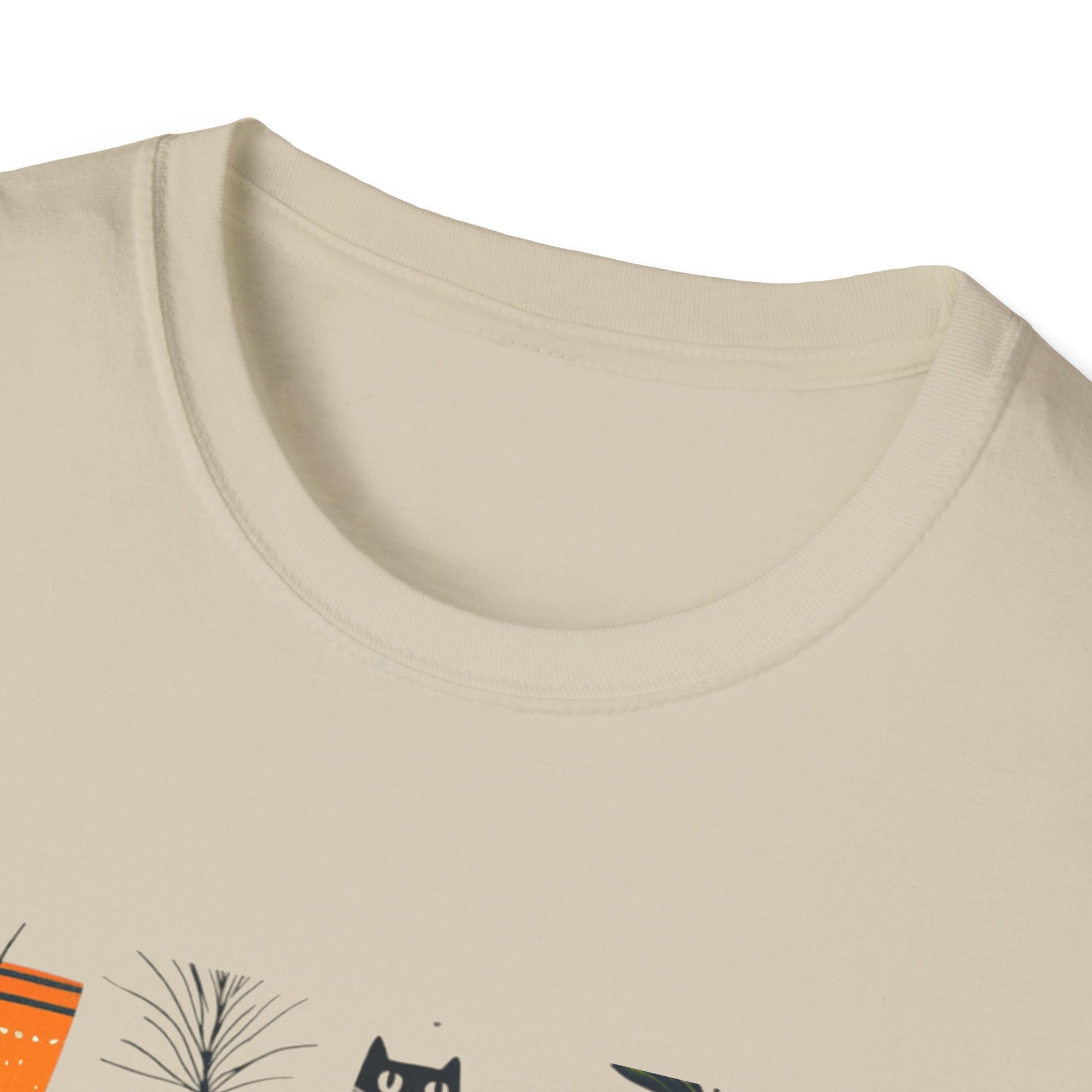 Cream Colored plants and cats graphic t-shirt featuring playful botanical and cat designs