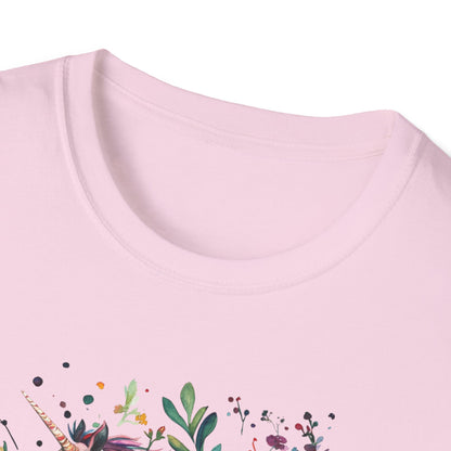 Soft pink Sagittarius unicorn t-shirt featuring colorful floral designs and a whimsical unicorn illustration