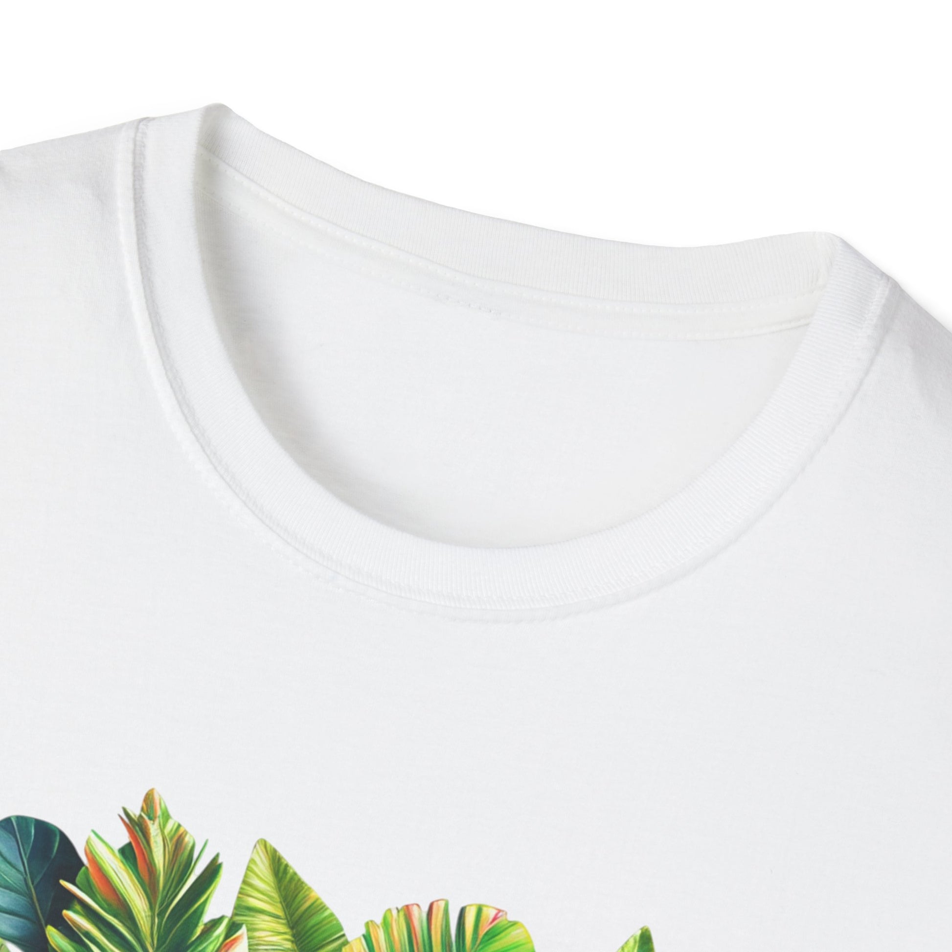 Detail of a white tropical 5D vibes t-shirt featuring vibrant green leaf prints on the neckline
